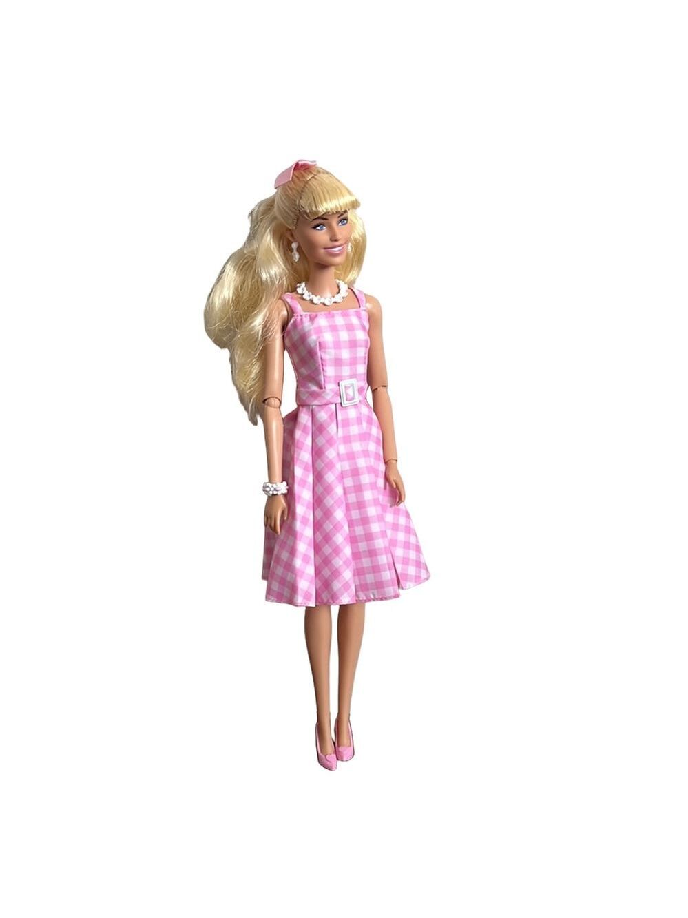 Collectible Barbie movie Margot Robbie doll in Pink and White Casual Sundress